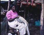 sisal weaver creating ikat handbag